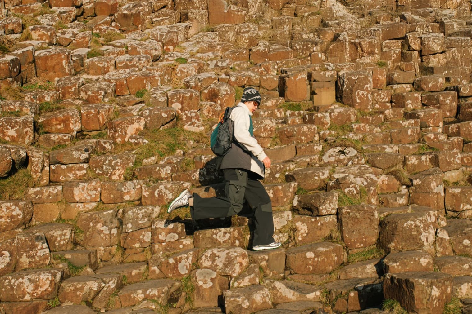 A model wearing a lightweight technical jacket