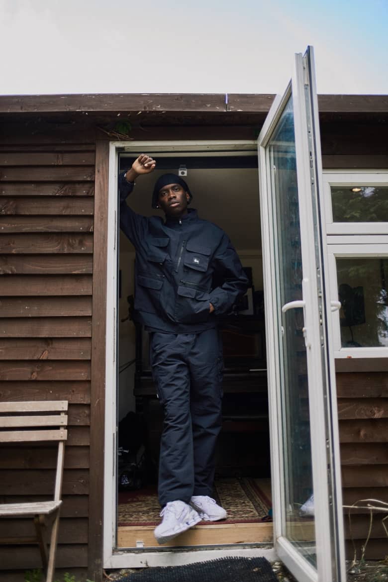 Master Peace wearing Stüssy at his home studio. 