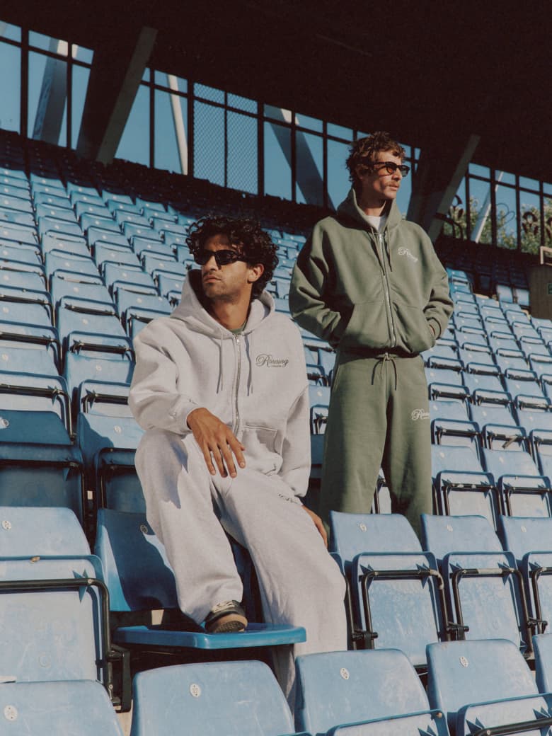 Two men wearing the END. x Ronning collection