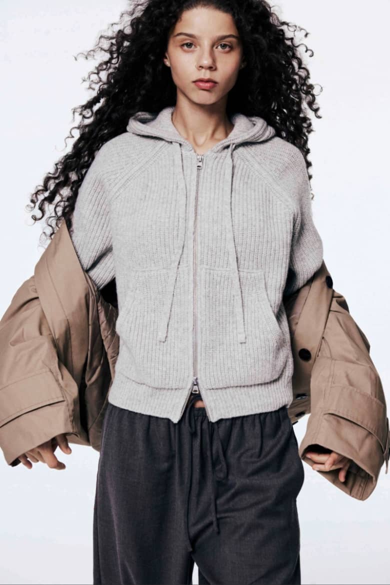 A model wearing Dunst knitwear
