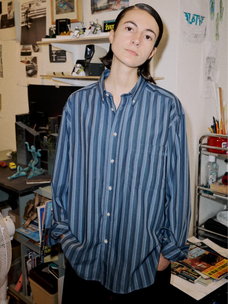 A model wearing a Polar Skate Co. Striped Shirt