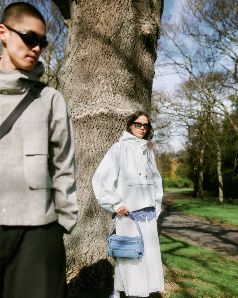 A man and woman wearing lightweight jackets