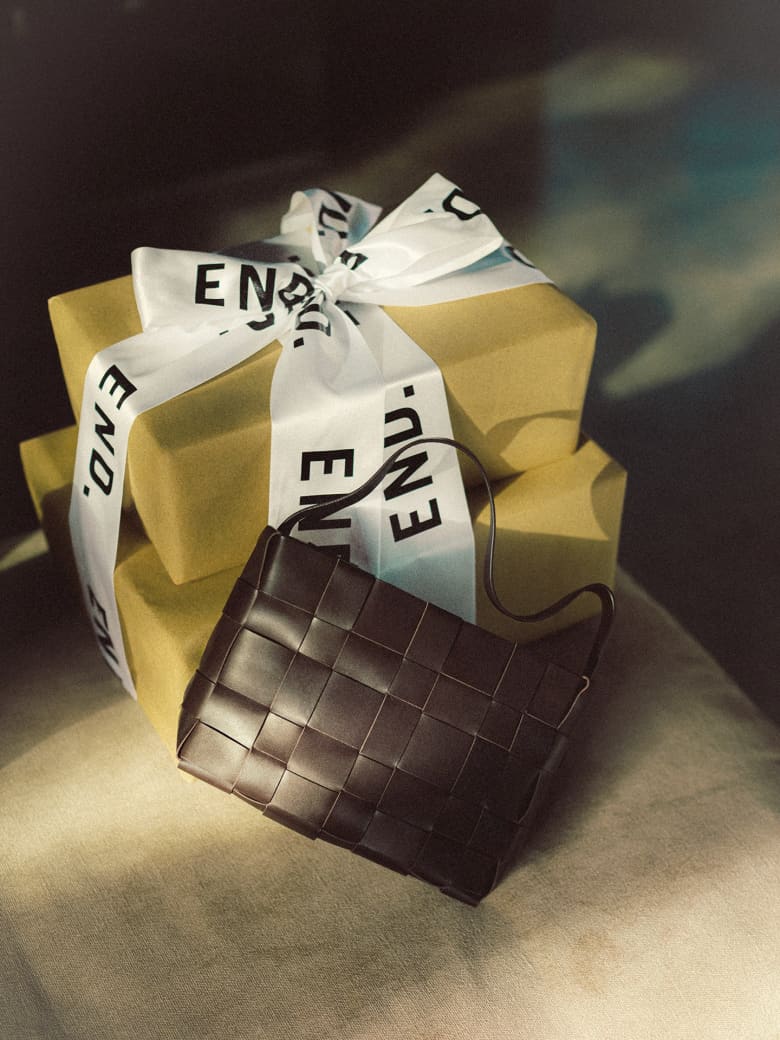 Saint Agni woven mini tote bag in the colour chocolate. 