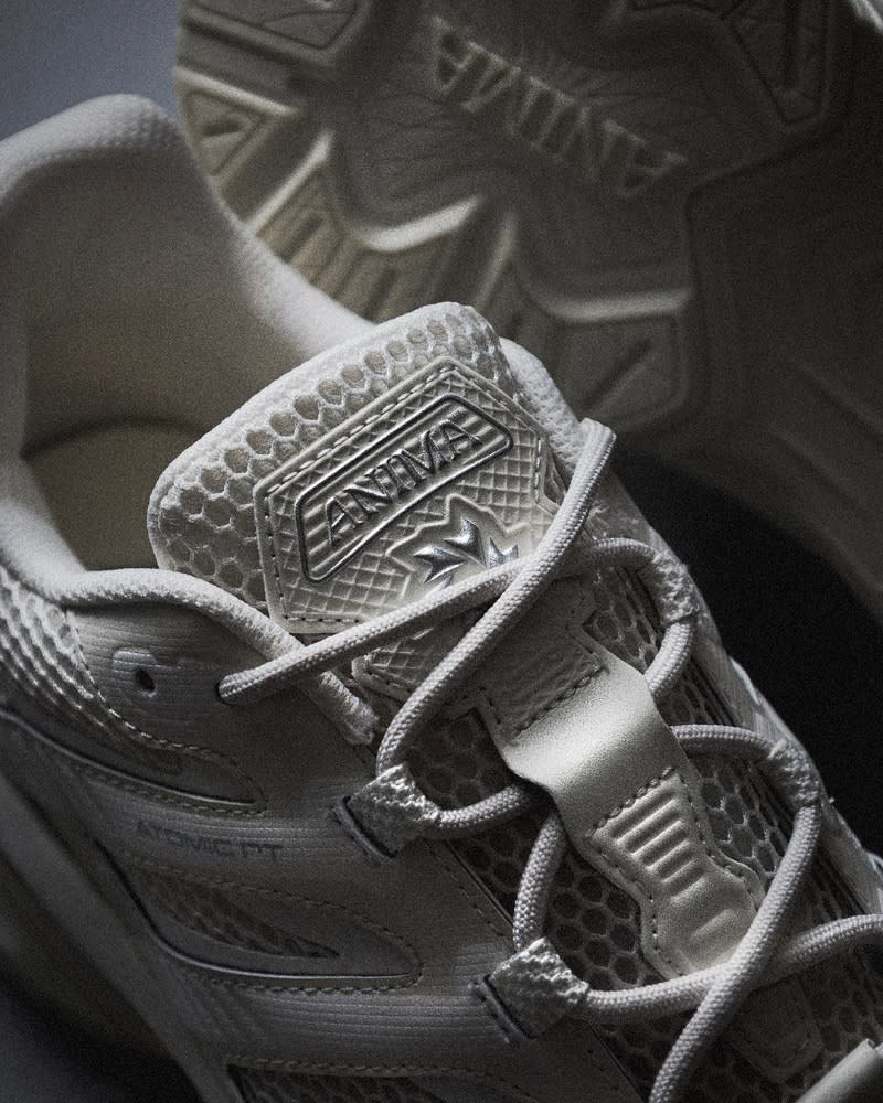 A close up of an Anima sneaker in white