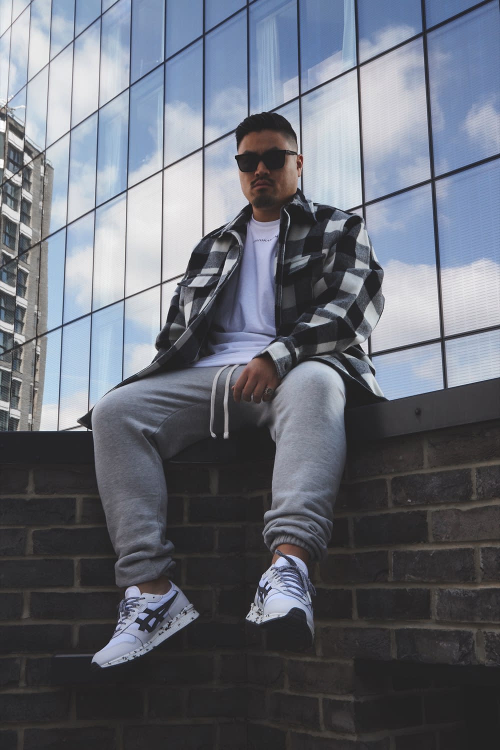 Thierry Tek of Visionarism wearing Visionarism x ASICS TIGER HyperGEL-LYTE for END.