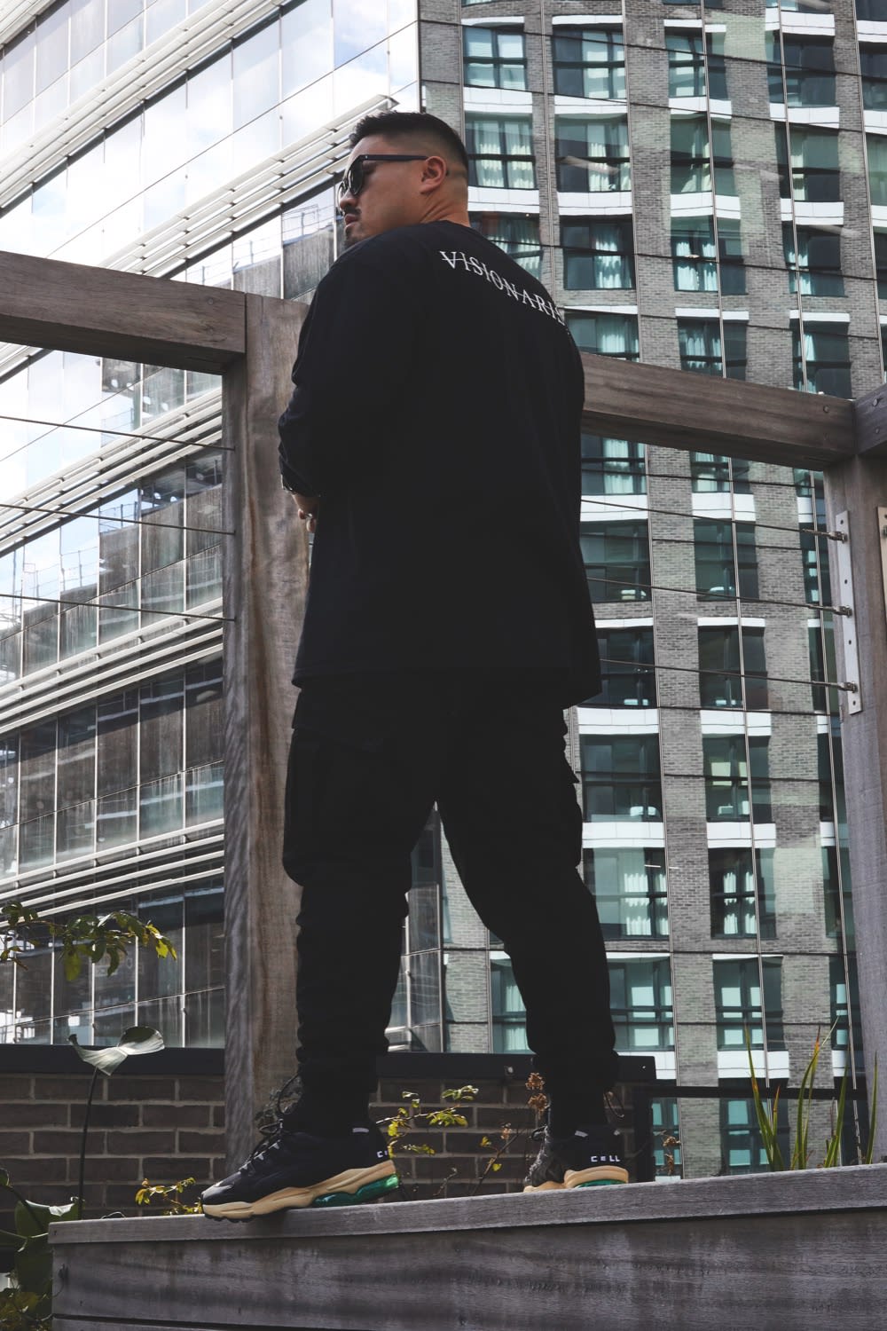 Thierry Tek of Visionarism wearing Rhude x PUMA Cell Alien OG for END. Style Code: 370875-01