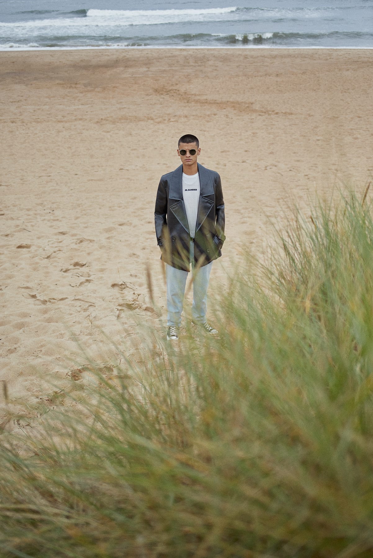 On the dunes with a Comme Des Garçons Homme Plus PVC Peacoat for Bare Minimum END. editorial. 