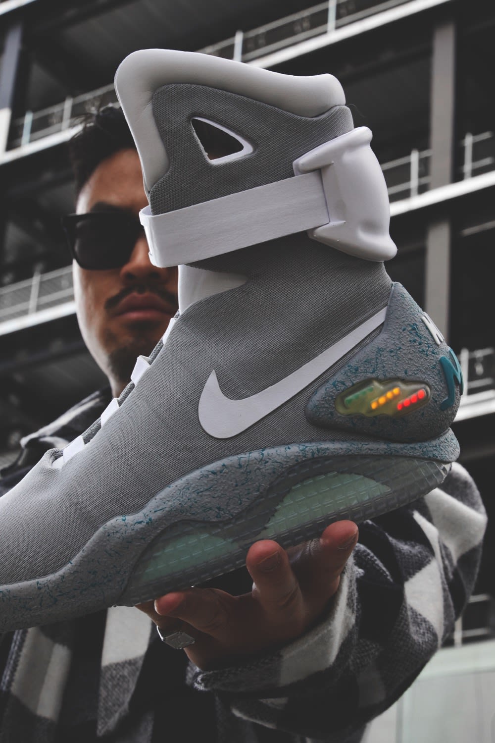 Thierry Tek of Visionarism holding Nike Mag Back To The Future 2016 Style Code: H015-MNOTHR-402