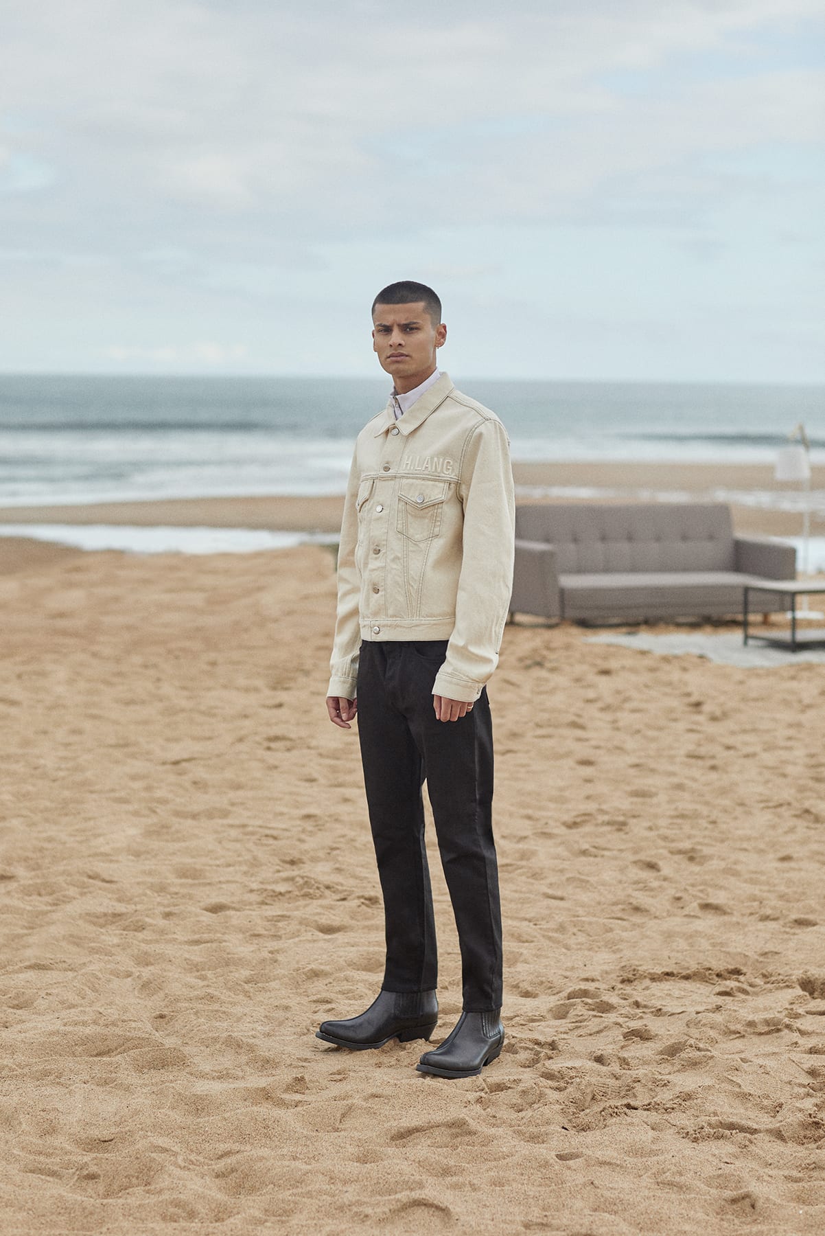 Helmut Lang trucker jacket worn at the beach for Bare Minimum END. editorial