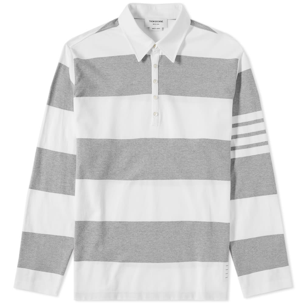 Click to view more detailed imagery on our partner's website Thom Browne Rugby Stripe Relaxed Fit Long Sleeve Polo In Grey