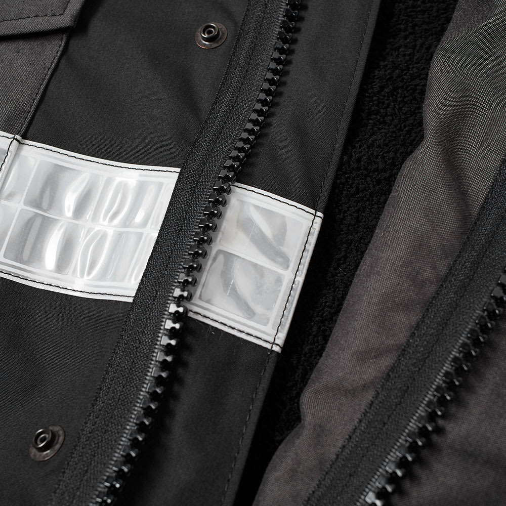 Junya Watanabe MAN Eye Reflective Taped M65 Jacket Black | END.