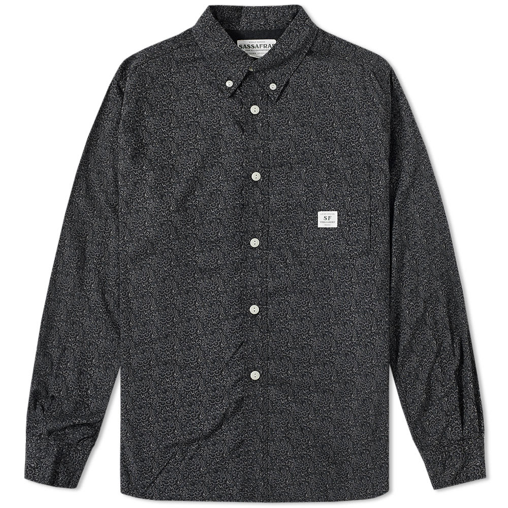 A concept that goes far beyond garden attire, Sassafras takes unique elements of workwear and creates functional, comfortable and heavy duty clothing. A niche Japanese label that started out in 2004, has now established itself in rich clothing intended for garden use – although it works just as well as part of a stylish, durable wardrobe. The Green Thumb Shirt is Sassafras' take on a classic button-down Oxford, simplistically styled with button cuffs and a single pocket to the chest.

100% Cotton
Button Cuffs
Single Chest Pocket
Sassafras Tag To Pocket
Button Down Collar
Made In Japan