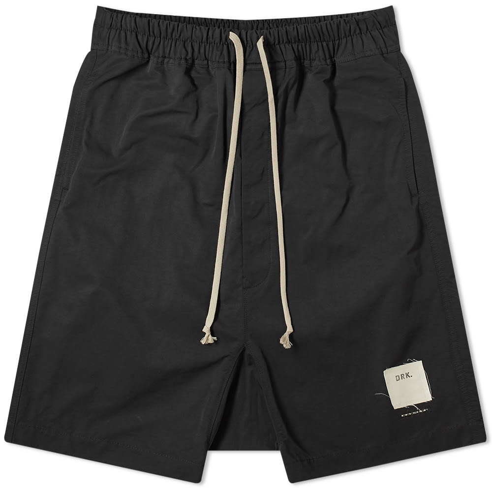 Teaming up to exhibit an architectural vision of menswear, END. and Rick Owens DRKSHDW offer a capsule infused with minimalist tendencies and a maximalist outlook. Placing a focus on the second life of the garment, these Pods shorts from the master of dark’s DRKSHDW collection are altered with a hint of END.’s streetwear sensibility, yet still embody Owens’ brutalist vision and glamourous rock’n’roll attitude. Finished in the designer’s signature black, an exaggerated dropped crotch and elongated drawstrings deliver a bold aesthetic statement, with a woven ‘DRK.’ patch in END.’s iconic style supplementing and refining the offering. With ever-present dual stripes – personalised with END. branding – appearing to the reverse, these shorts are firmly rooted within Owens’ carefully curated universe and deliver his aesthetic with uncompromised authority.53% Nylon, 47% CottonElasticated Drawstring Waist2 Side Entry Pockets2 Back Patch PocketsWoven Brand Tab