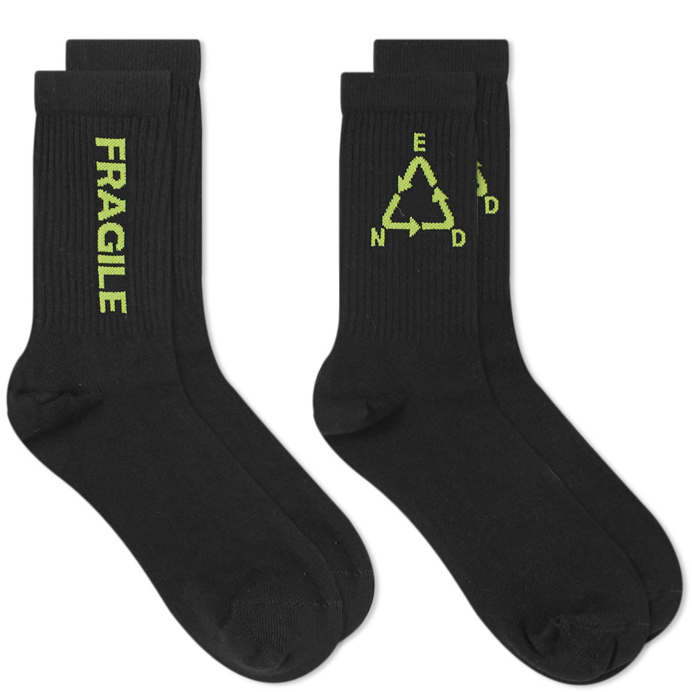 Following their successful Double A collaborative capsule, END. and Wood Wood join forces once again to deliver the ‘Fragile’ collection. Enriched with a distinctly industrial aesthetic and packaged in bespoke pouches made from 100% recycled paper, each item receives a healthy dose of Copenhagen style and a pinch of contemporary detailing. Receiving a hint of stretch to the ribbed knit for comfortable all-day wear, this duo of black socks wears a redesigned iteration of the British retailer’s logo – taking the form of the infamous recycling emblem – to one pair and ‘FRAGILE’ to the other.2 Pack80% Cotton, 18% Polyamide, 2% ElastaneRibbed KnitEngineered Branding