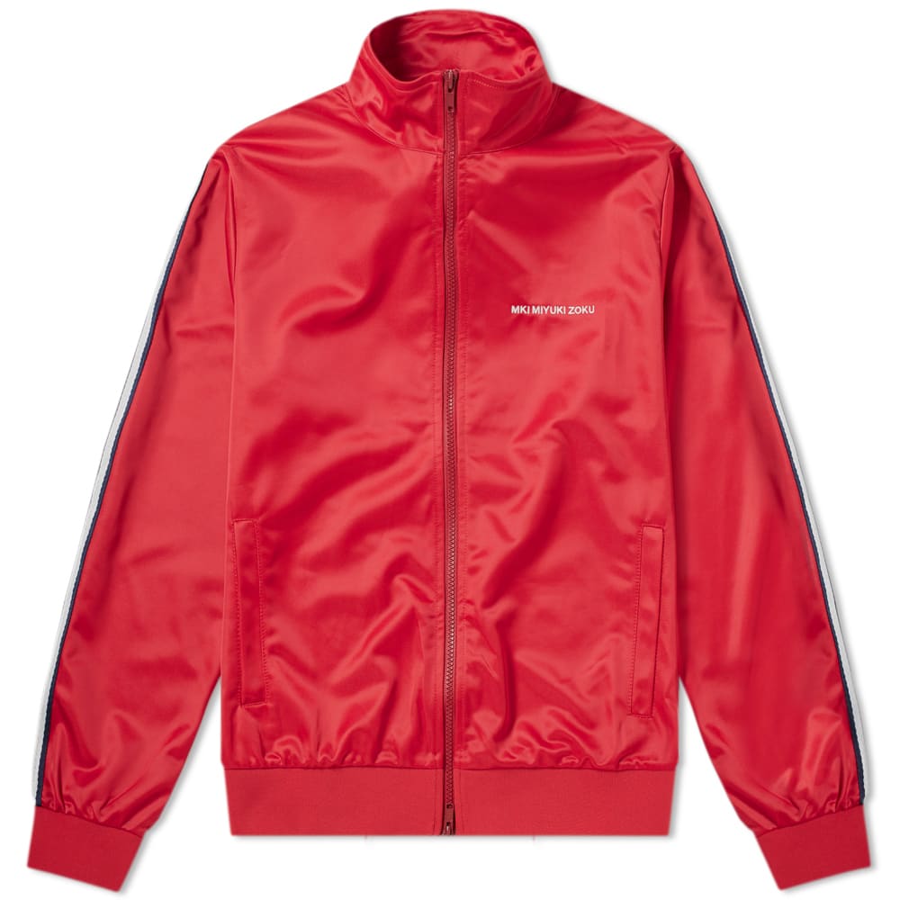 A red-hot track star to add to your streetwear collection, MKI issue this jacket in a cherry red colourway. Smooth, sleek and lightweight for comfort on the go, the zip-up jacket brings sports references in abundance; hosting stripes down each sleeve, while embroidered MKI branding completes the ‘80s remake.

100% Polyester
Stand Collar
2-Way Zip Closure
Taped Sleeves
Embroidered Branding
2 Side Entry Welt Pockets
Ribbed Cuffs & Hem