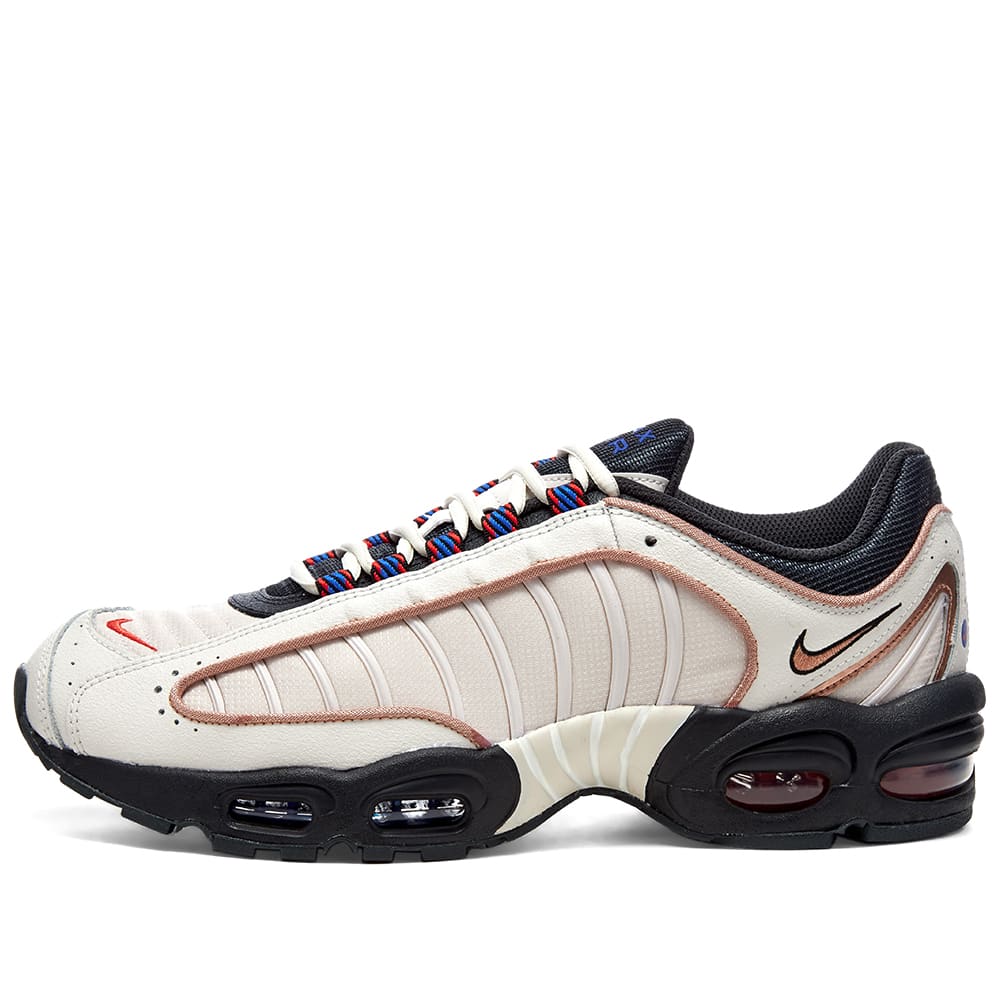 nike tailwind cream