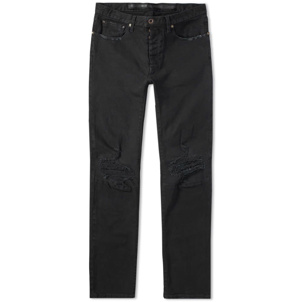 Disrupting the ordinary, Unravel Project’s signature aesthetic is placed onto this pair of cotton blend denim jeans this season. Distressed throughout, this black pair are kitted out with five pockets and are secured with a partially exposed buttoned fly.
 
98% Cotton, 2% Polyurethane
Slim Fit
Distressed Denim
5 Pockets 
Button Fly