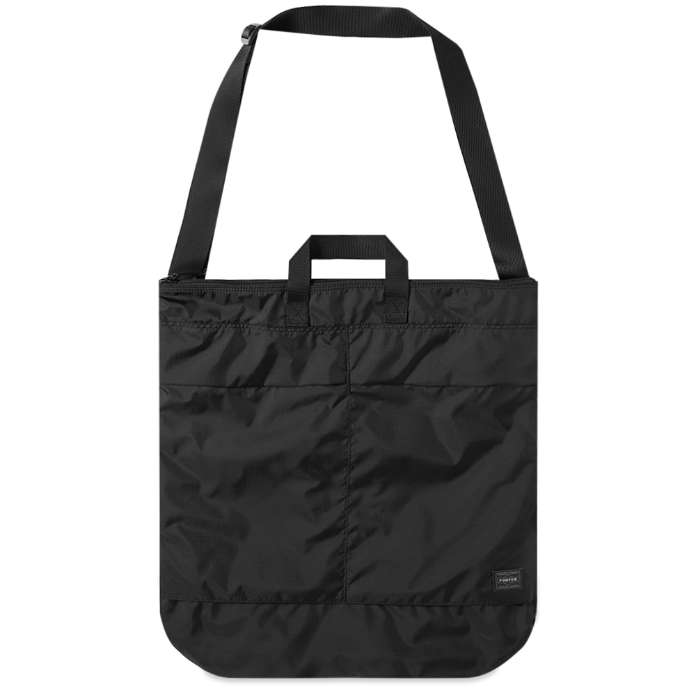 Designed to be carried in hand or over the shoulder, this Porter-Yoshida & Co. ‘Helmet’ bag is a spacious accessory that’ll accompany you during your daily commute. Made in Japan from ripstop nylon, the all-black bag has plenty of practical compartments to keep you organised.

100% Nylon 
Ripstop Fabric
Main Zip Compartment
Interior Zip Pocket
Woven Brand Patch 
2 Carry Handles 
Adjustable Shoulder Strap
Made in Japan