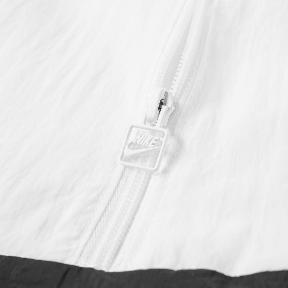 swoosh half zip running jacket