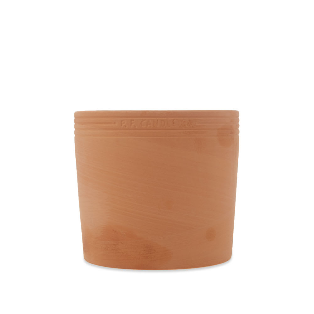 Igniting founder Kristen Pumphrey’s DIY spirit and all-natural tendencies, P.F. Candle Co.'s brand new ‘Terra’ collection delivers the Juniper soy candle. Inspired by happy-go-lucky road trips along the coastline and camping adventures in the depths of the Eastern Sierra, the nourishing, purifying and transportive scent leans on ingredients of juniper berries, pine, fir needle and cedarwood to ignite light, while the aroma is hand-poured into the label’s lightly glazed terracotta vessel – a pot which can be upcycled to house plants and is guaranteed to patina authentically over time.

17.5oz
Natural Soy Wax
All-Natural Fragrance Oil
Cotton Wick
75-85 Hours Burn Time
Handmade in California

Hand poured into terracotta vessels, throughout the candle’s life each lightly glazed pot will age and take on a unique patina.