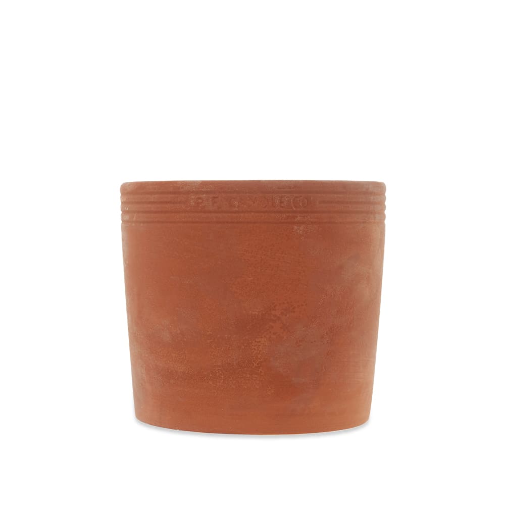 Bringing the tranquil, balmy air of a Los Angeles-based summer into your home, P.F. Candle Co. present their Olive No.04 candle by way of the ‘Terra’ collection. Set within the serenity of olive tree groves, the aroma warms, grounds and encourages peace of mind to those who surround it; expressing uplifting tones of cedarwood, cypress, orange, earthy galbanum and olive oil. This all-natural product is housed within the Californian brand’s newly glazed terracotta vessel – a pot with distinctive wabi-sabi charm, sure to patina authentically overtime and prepared to be upcycled under your own preference.

17.5oz
Natural Soy Wax
All-Natural Fragrance Oil
Cotton Wick
75-85 Hours Burn Time
Handmade in California

Hand poured into terracotta vessels, throughout the candle’s life each lightly glazed pot will age and take on a unique patina.