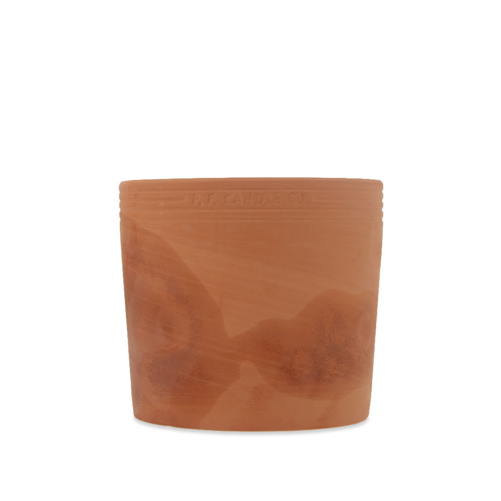 Hand-poured in the brand’s Californian studio, P.F. Candle Co.'s Geranium Terra Soy candle is housed in a neutral-blush jar and is perfect for adding that rustic touch to any interior setting. Produced from natural soy wax, this 17.5oz version is inspired by the refreshing breeze of botanical gardens and the blooming plants that inhabit them.  Burning for up to 85 hours, the geranium, rose, citrus and palmarosa scent is sure to ignite a vibrant, lasting aroma in the home.

17.5oz
Natural Soy Wax
All-Natural Fragrance Oil
Cotton Wick
75-85 Hours Burn Time
Handmade in California

Hand poured into terracotta vessels, throughout the candle’s life each lightly glazed pot will age and take on a unique patina.