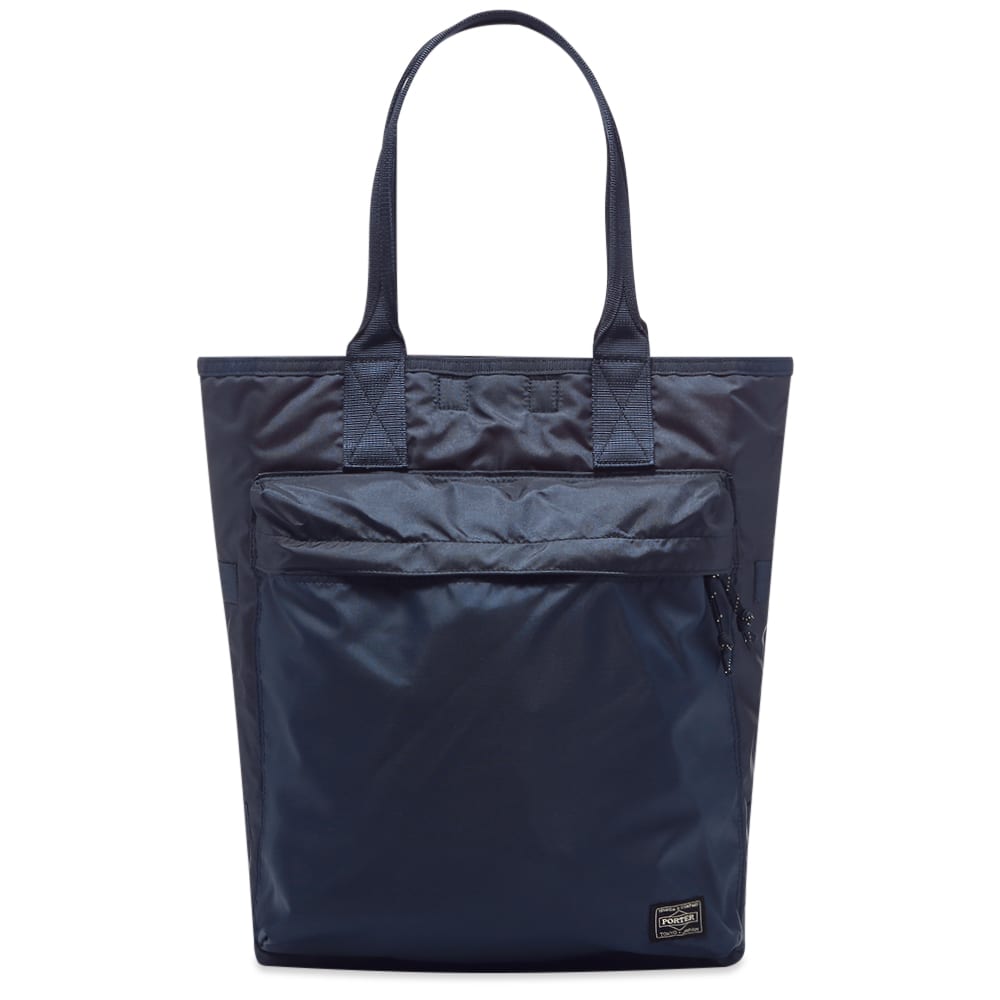 Made in Japan and kitted out with a pair of carry handles, Porter-Yoshida & Co.’s nylon tote bag is dressed in navy blue this time around. Well known for its durable bags and accessories, the Tokyo-based label completes the trusty tote with a zipped front pocket that’ll keep your everyday essentials close by at all times.

100% Nylon
Front Zip Pocket
Interior Pocket
Woven Brand Patch 
2 Carry Handles
Made in Japan