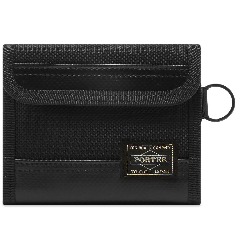 Dressed in all-black, this robust nylon wallet from Porter-Yoshida & Co. has been crafted in the label’s Japanese homeland. Equipped with a range of handy compartments, the durable accessory has a practical key ring attachment and is branded with a signature woven patch.

100% Nylon
Zip & Velcro Compartments
Press Stud Closure 
6 Card Slots 
Receipt Pocket
Key Ring 
Woven Brand Patch
Made in Japan