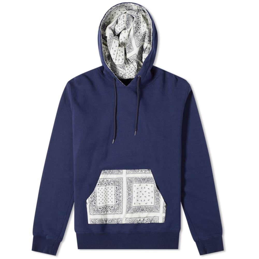 SOPHNET.’s AW19 collection was all about minimalism and subdued graphics, but it made an exception for this navy hoody, which is boldly printed with a bandana-style pouch pocket and hood lining. Made in Japan with comfortable pure cotton, it’s signed off at the wrist with a subtle embroidered scorpion. 100% CottonDrawstring HoodPouch PocketEmbroidered BrandingRibbed Cuffs & HemWoven Brand PatchMade in Japan
