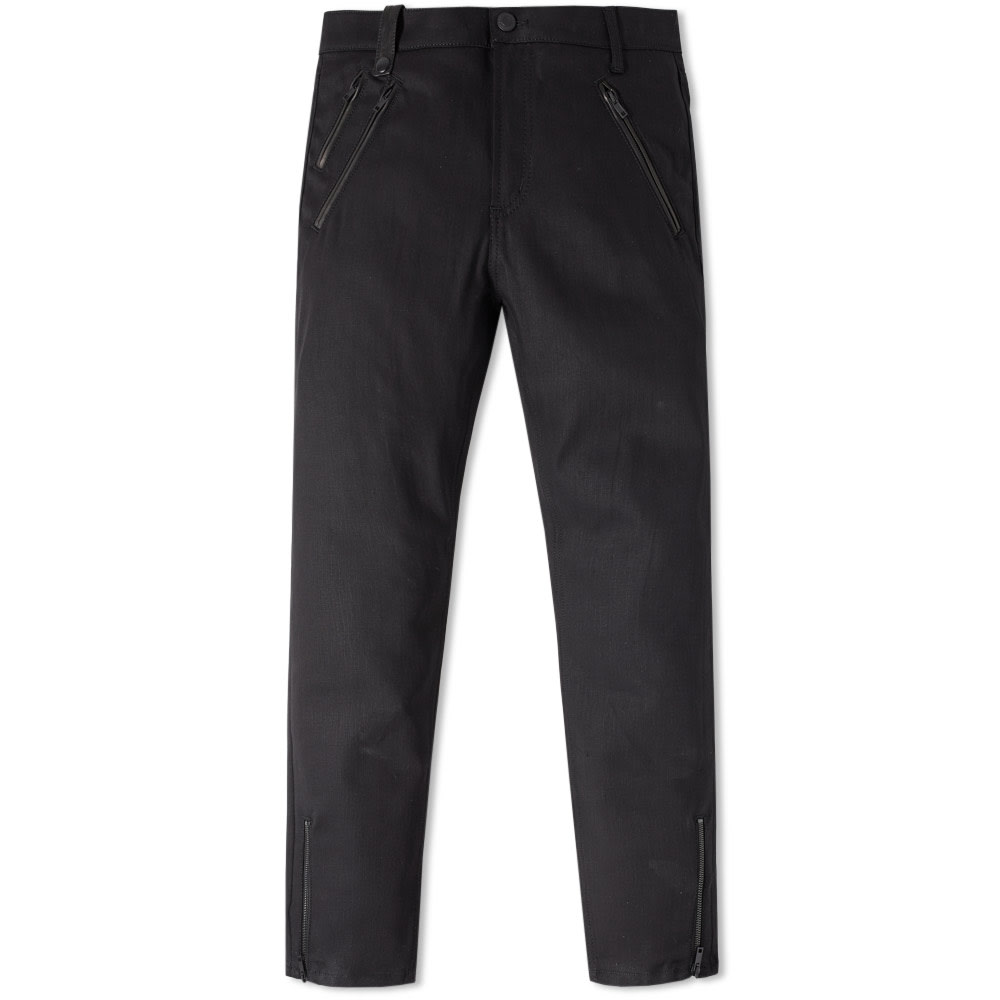 With the AW16 Pre-Collection designer Sarah Burton continues to reinvent the signature motifs and themes that made Alexander McQueen's house one of the most iconic names in fashion.Lending the brand’s dark aesthetic to a classic biker style, this biker jean has been crafted in Italy from a cotton-blend stretch denim, trimmed with a soft black leather to the pockets.

Cotton-Blend Stretch Denim
3 Zipped Pockets To Front
Leather Patch Pockets To Back
Slim Cut Leg
Matte Black Hardware
Leather Tag To Waistband