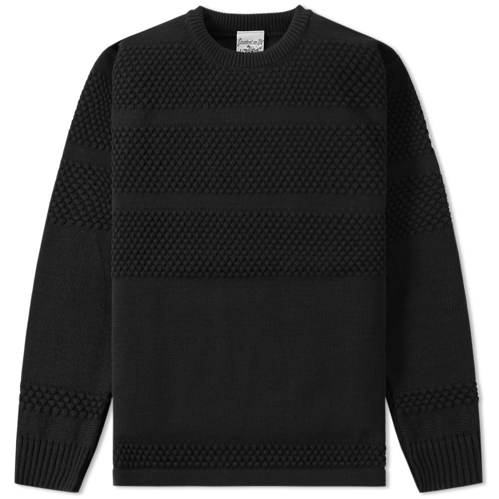 S.N.S. Herning have a rich heritage in producing some of the finest knitwear around, basing their knowledge on close to a century of supplying Scandinavian fisherman with essential, warming knits. This waffle-textured, virgin wool knit features striped panels and is finished with ribbed crew neck, cuffs and hem. A perfect addition to the wardrobe for the upcoming cold seasons.

100% Virgin Wool
Waffle Textured Knit
Stripe Panel Detailing
Ribbed Crew, Cuffs And Hem
