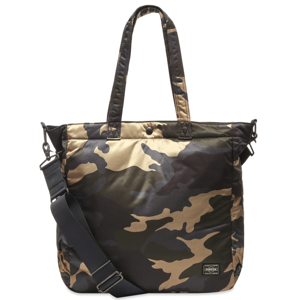 A tote that’s expertly designed to house your laptop and everyday essentials, Porter-Yoshida & Co.’s ‘Counter Shade’ bag is built in a robust nylon construction and comes covered in a covert woodland khaki camouflage. Easy to carry thanks to its two handles and adjustable strap, the bag is secured with a single press stud and is signed off with a simple woven brand patch at the front.

100% Nylon 
Laptop Compartment
Press Stud Main Compartment
2 Side Pockets
Woven Brand Patch
2 Carry Handles 
Detachable Shoulder Strap
Made in Japan