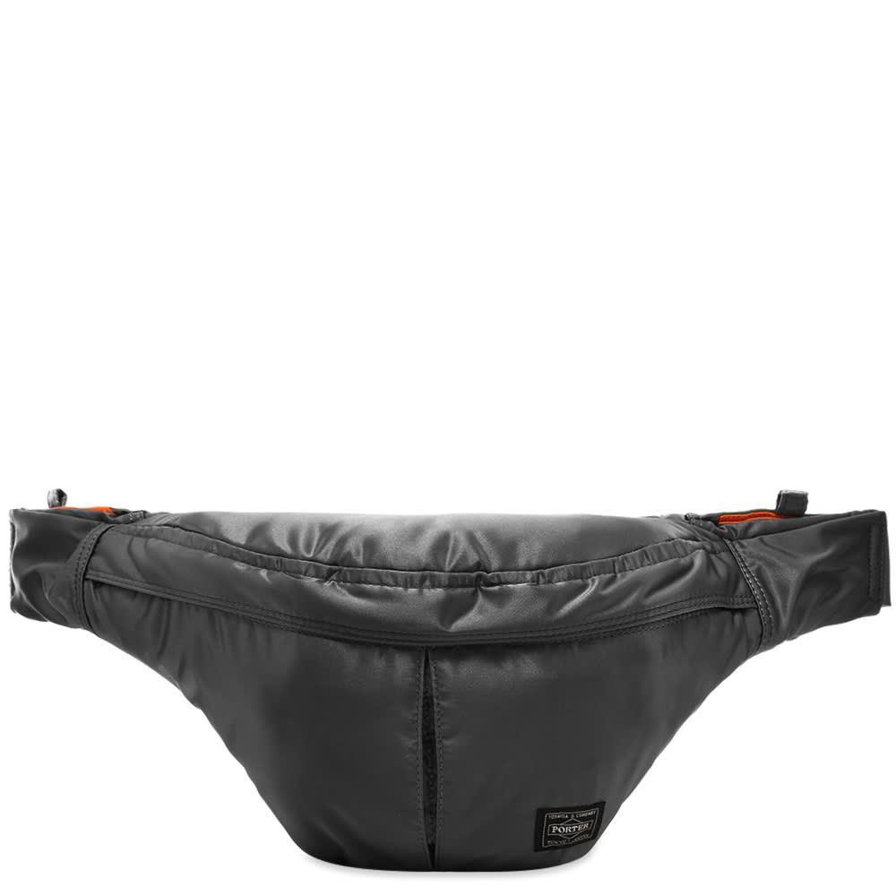 Take on the daily commute in style thanks to this premium waist bag from Japanese label Porter-Yoshida & Co.’s latest drop of functional accessories. Crafted in a durable nylon build, the versatile piece can be worn two ways and comes kitted out with plenty of handy compartment; one of which is topped with a signature woven brand patch.

100% Nylon
Main Zip Compartment
2 Front Zip Pockets 
Woven Brand Patch
Adjustable Waist Strap