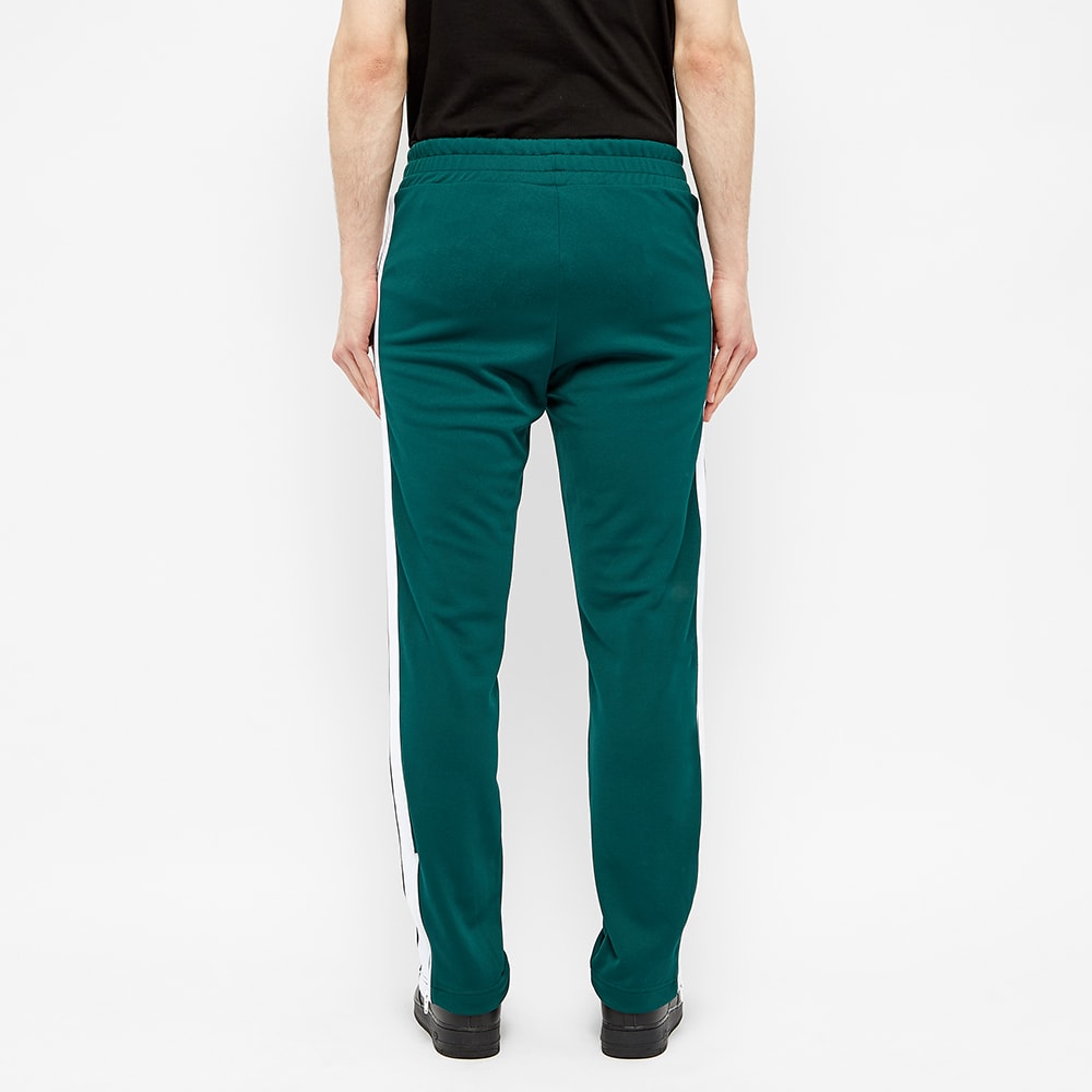 green and white track pants