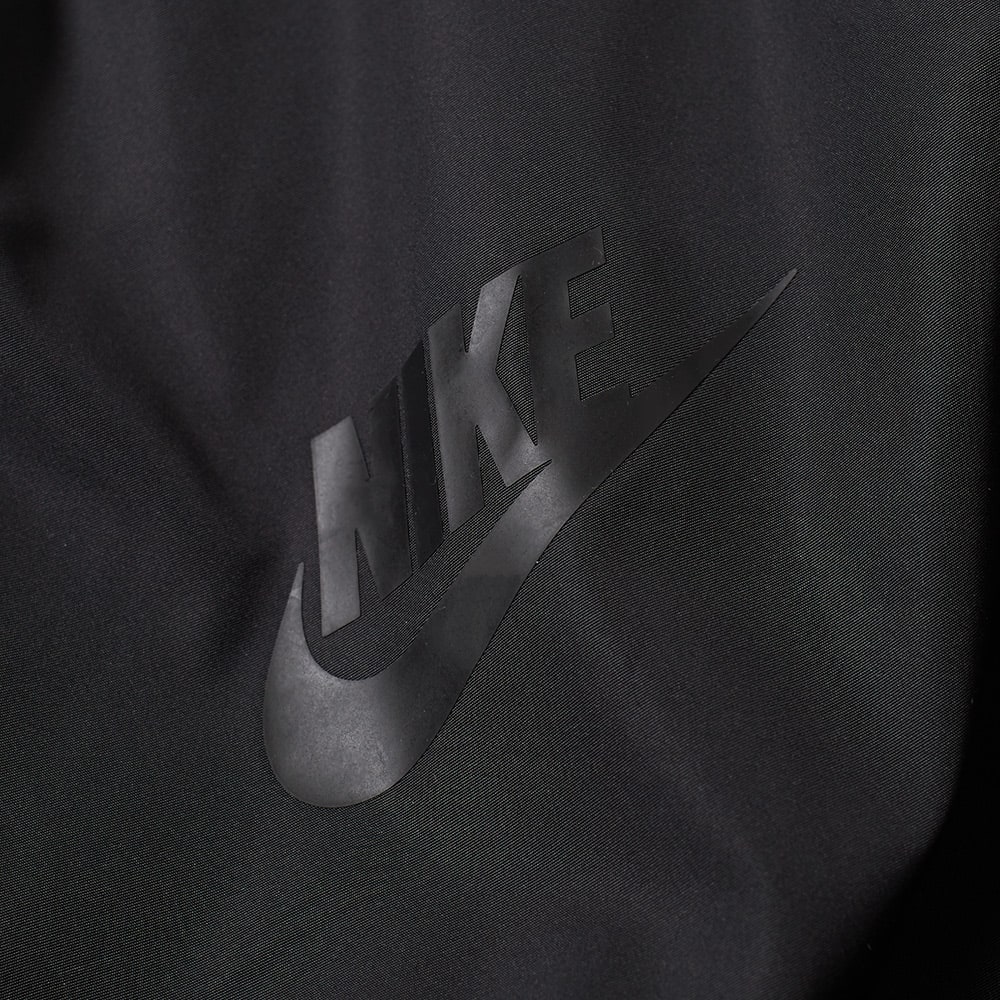 nike tech knit varsity jacket
