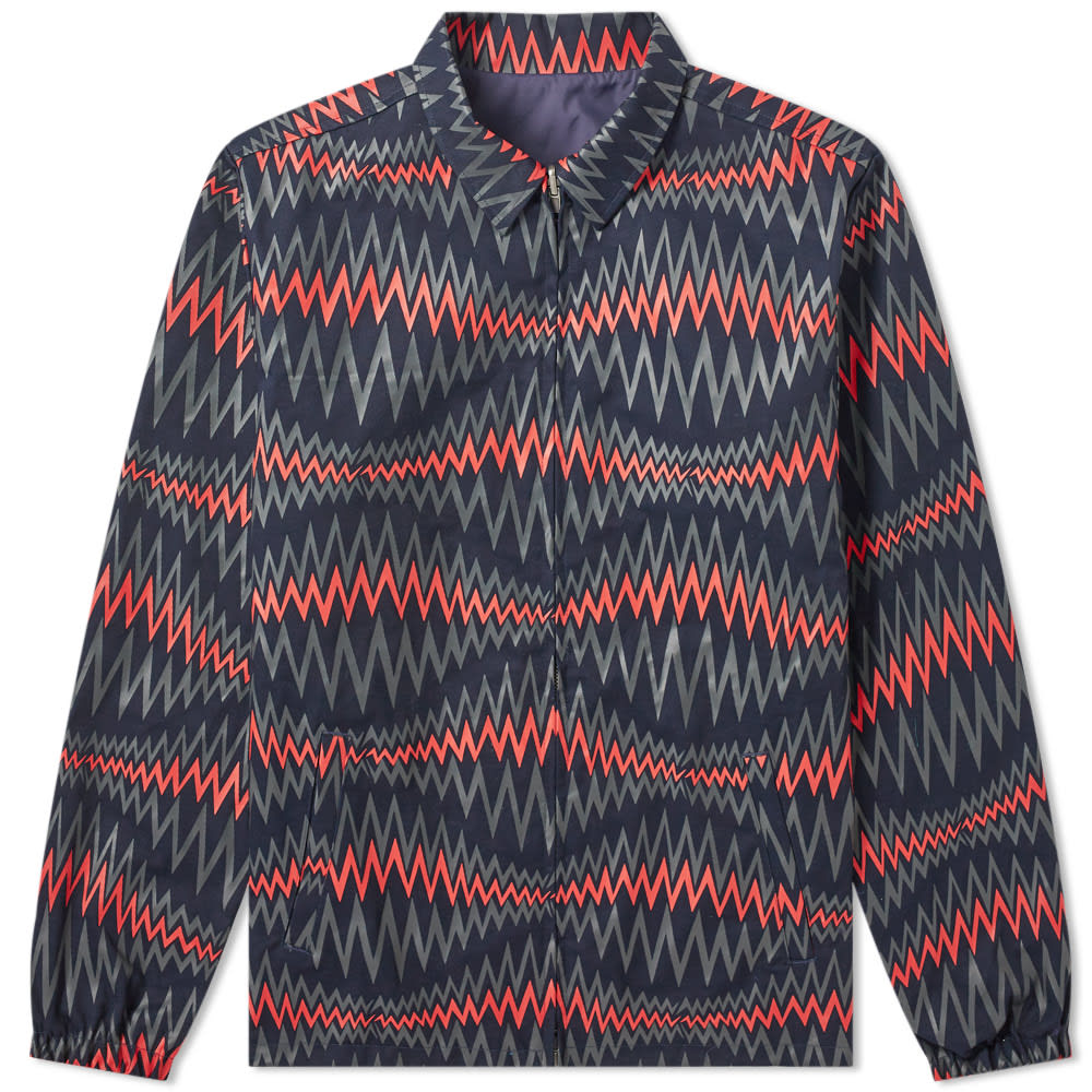 Focusing on streetwear culture, Pharrell and Nigo put their own spin on this Billionaire Boys Club coach jacket. Dressing one side in navy, the label stamp their signature branding on the back and to the chest for a clean aesthetic. On the reverse side, the jacket is decorated with a colourful pattern that is reminiscent of soundwaves, giving this versatile layer a unique appeal. Boasting a classic collar and two side entry pockets on the front, the piece is secured with a zip closure for a neat finish.

100% Cotton
Reversible
Nylon Lining
Zip Closure
2 Side Entry Pockets
Printed Branding