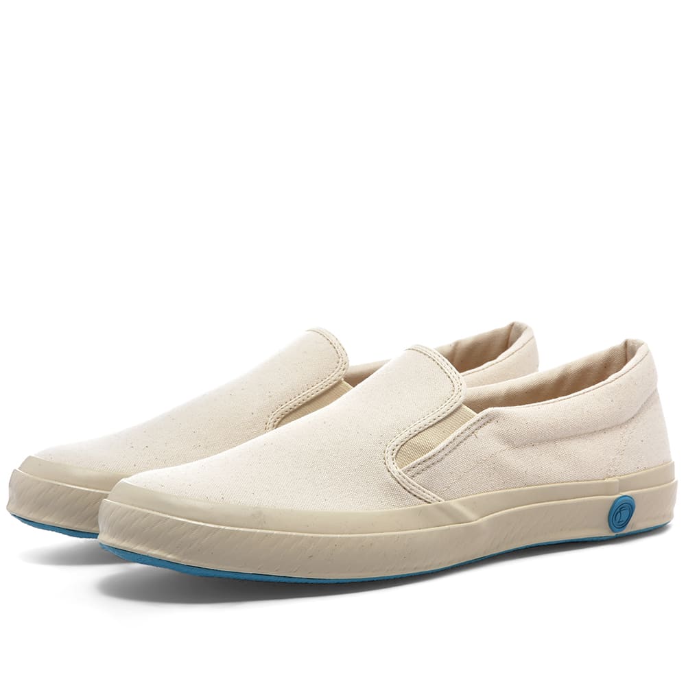 Offering up a classic slip on style, Shoes Like Pottery combines a distinctive manufacturing process with its exceptional minimalist approach. Centering around kiln-fired vulcanised soles, these sneakers deliver a robust take on a simple style. Finished with elasticated panels and a rubberised brand stamp to the heel, Shoes Like Pottery ensures that style and substance are delivered hand in hand.  
 
Canvas Uppers 
Elasticated Panels
Rubberised Brand Stamp 
Vulcanised Rubber Outsole 
Made in Japan