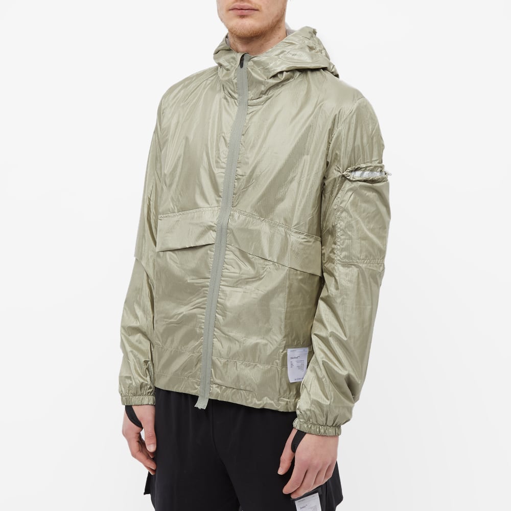 Satisfy Silvershell Packable Windbreaker Vetiver END. (KR)