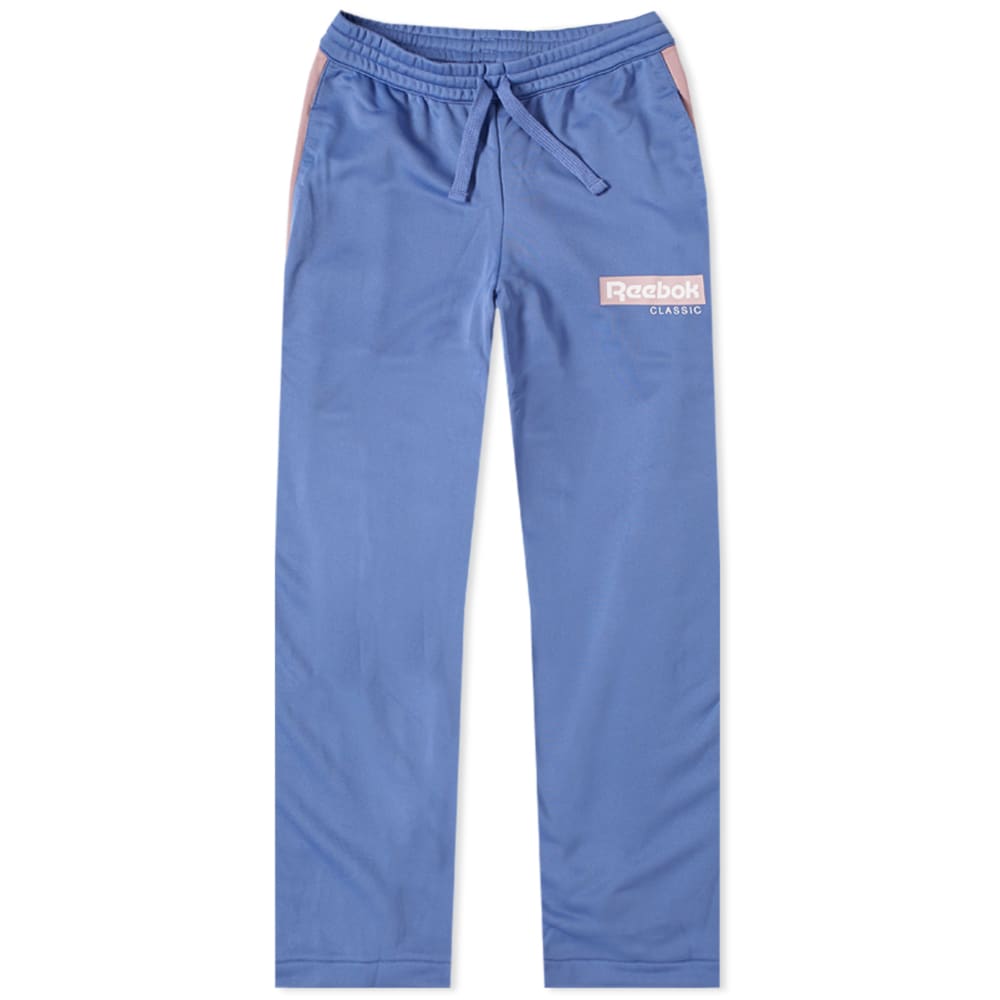Delivered in a two-tone colourway of ultra-violet, these retro popper pants by renowned sporting brand Reebok enter the menswear scene through a nostalgic realm this season. Throwing it back to the ‘90s, this polyester pair boast press stud detailing on their outseams, while printed branding resides proudly to the thigh. Complete with a comforting drawstring waist, these bottoms carry your small everyday essentials with ease thanks to their two side entry pockets.

100% Polyester
Elasticated Drawstring Waist
Press Stud Outseams
Printed Branding
Embroidered Branding
2 Side Entry Pockets
