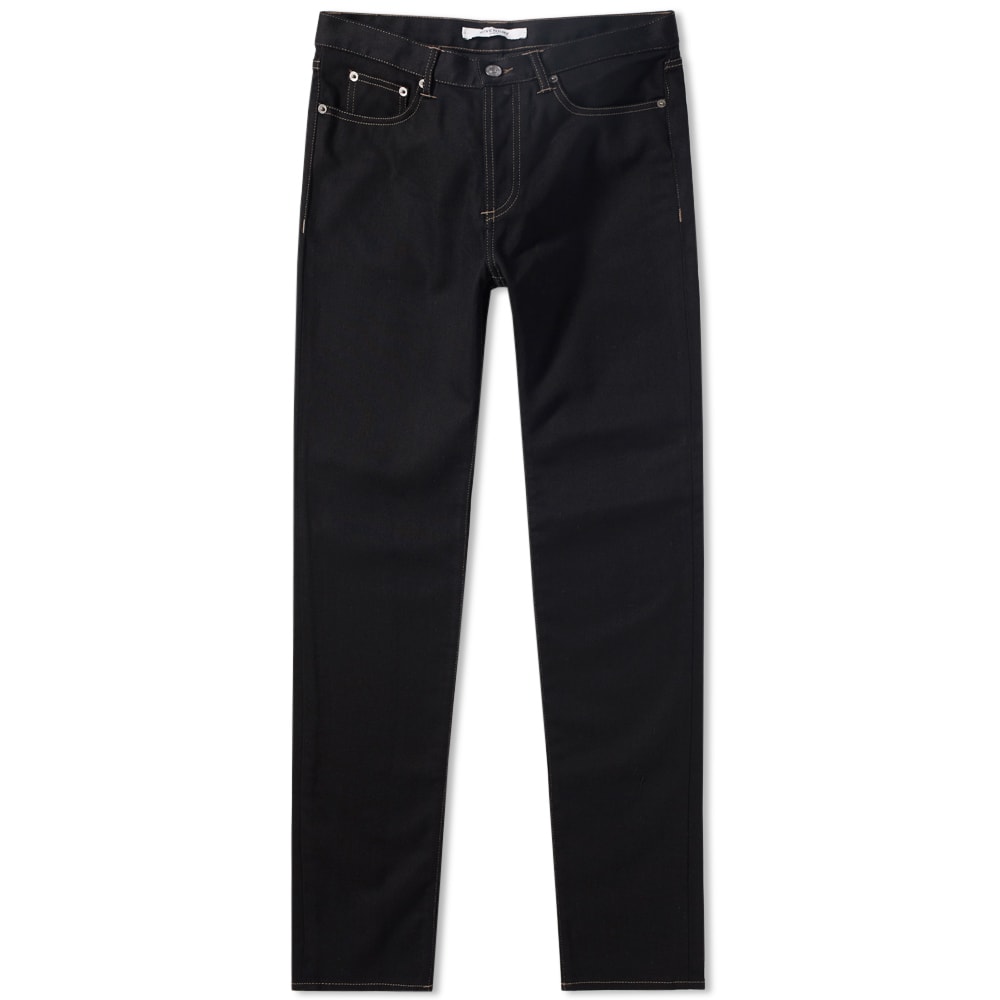 Maintaining their formidable presence within the fashion world, Givenchy’s AW ’18 collection balances relaxed and formal pieces. With their slim fit jean, the house provides a casual trouser that tapers slightly toward the ankle. Finished with light brown contrast stitching, an embroidered lightening bolt motif across the back pocket and a button fly, Givenchy’s slim fit jeans are the ultimate luxury casual legwear.  

98% Cotton, 2% Elastane
Low Rise
Slim Tapered Fit
Contrast Stitching
Button Fly
5 Pocket Set Up
Embroidered Logo
Branded Leather Patch
