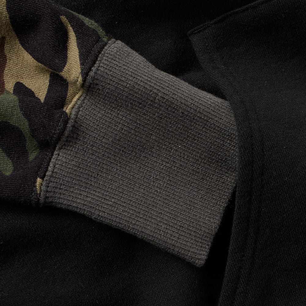 SOPHNET. Arch Logo Raglan Parka Black & Woodland Camo | END.