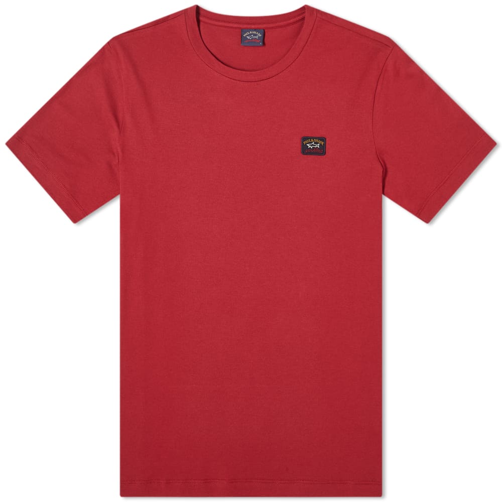 Arriving in a rich burgundy hue, this Paul & Shark tee will bring a vibrant pop to any look. Crafted in Italy from a soft cotton jersey, it is emblazoned with the luxury brand’s appliquéd patch to the chest, whilst ribbed knit to the neckline comfortably rounds off the style. 

100% Cotton
Ribbed Crewneck 
Appliqué Branding
Made in Italy