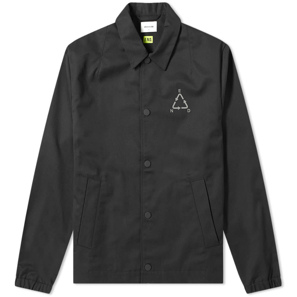 Following their previous collaborative capsule, END. and Wood Wood partner once again to share the ‘Fragile’ collection. Inspired by a distinctive industrial aesthetic, this Kael jacket is the pièce de résistance, delivering the Danish label’s signature sense of street-ready cool in a sleek black package. Secured with press studs, the jacket wears an END. logo, redesigned to replicate the infamous recycling emblem, to the chest, while ‘FRAGILE’ across the reverse in reflective 3M joins a bright green woven tab at the seam – ensuring the British retailer’s identity remains seen during transit. Rounding off the transitory theme, the item is packaged in a bespoke pouch made from 100% recycled paper, with the capsule’s signature parcel tape completing the aesthetic.65% Polyester, 35% CottonPress Stud Closures3M Printed Branding2 Side Entry PocketsWoven Brand Tab