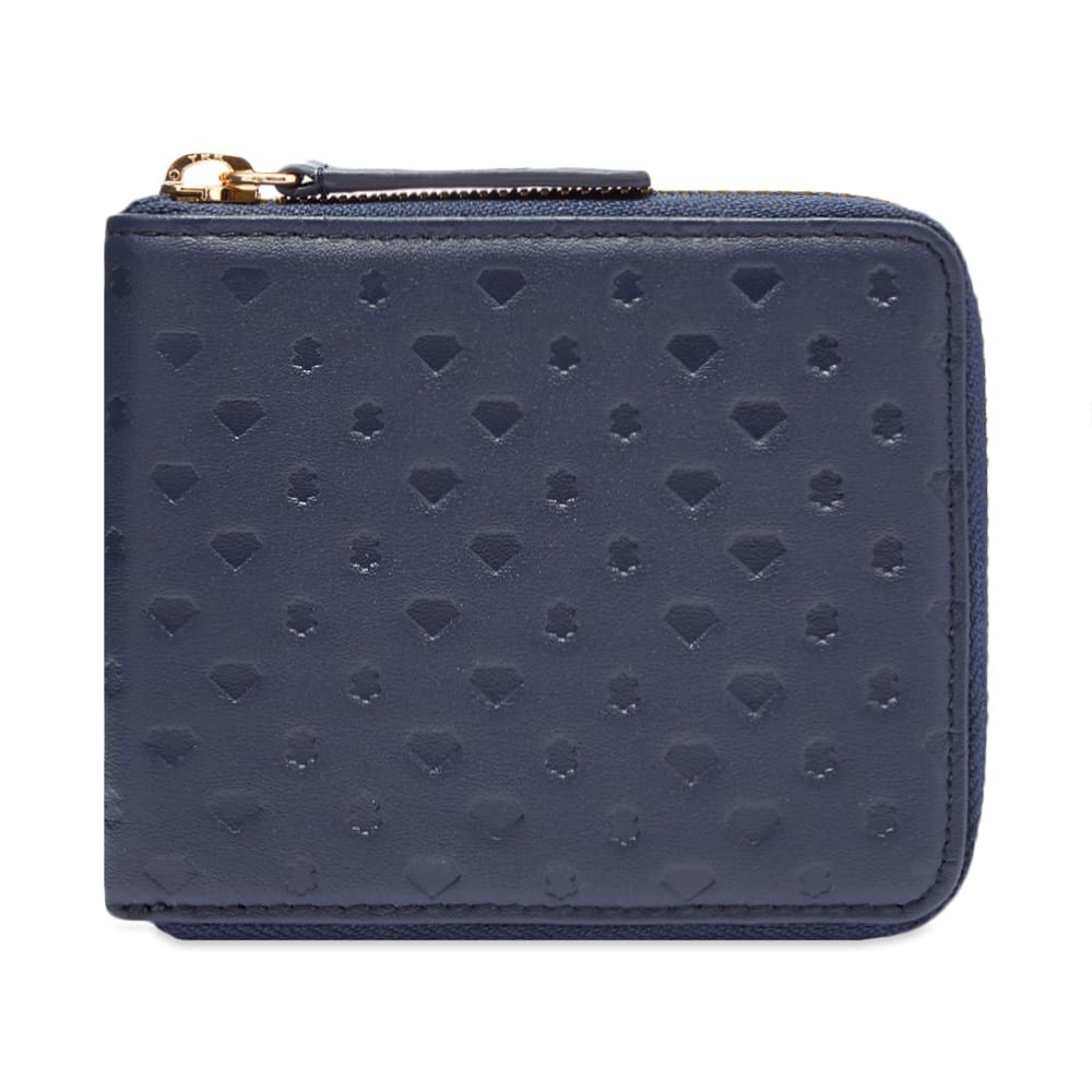 Offering a playful spin on a classic accessory, Billionaire Boys Club details its wallet with a seasonal diamond and dollar sign debossed throughout. Crafted from genuine leather, it comes equipped with four card slots and a compact pocket for your coins.   Leather Construction Zip Closure 4 Card Slots Note Sleeve Coin Pocket Debossed Branding