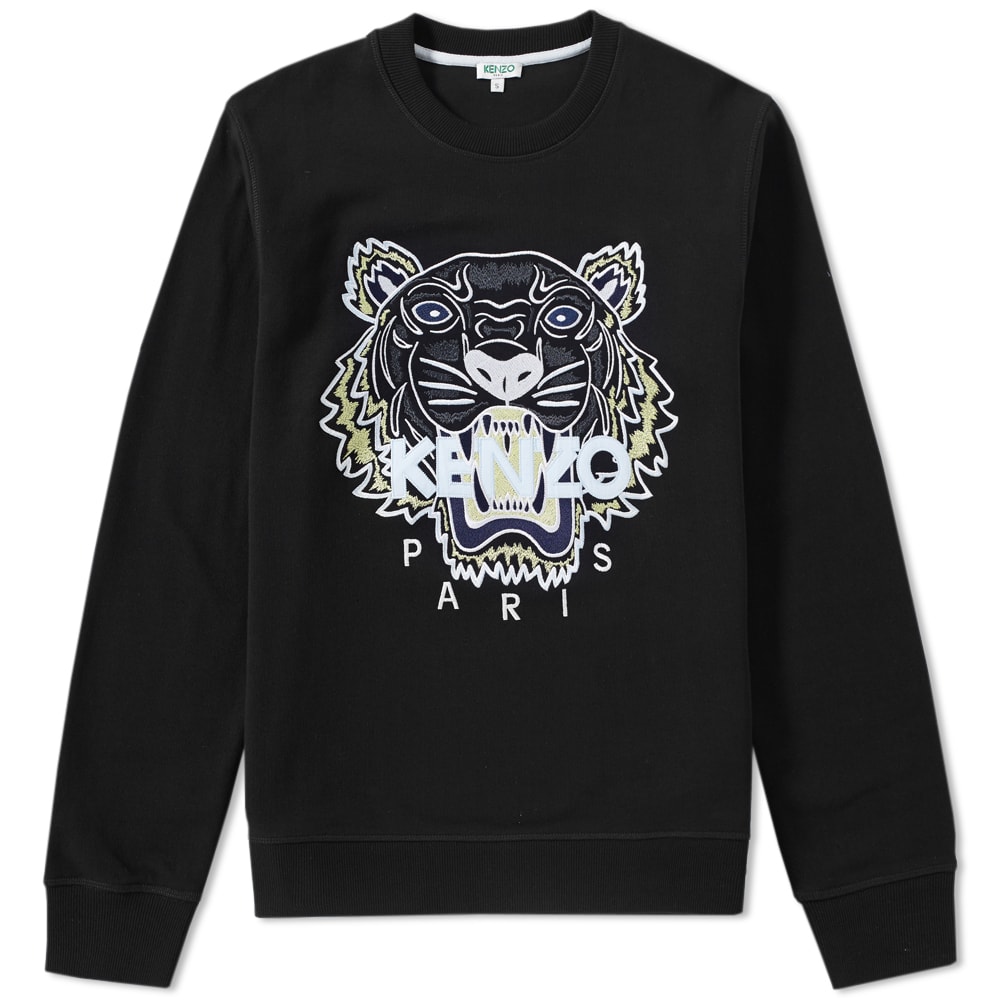 The latest drop from iconic French fashion house Kenzo, delivers a blend of casual silhouettes in a kaleidoscope of colourways with bold branding and idiosyncratic logos. The Tiger Face Crew Sweat delivers a classic cut, framed with ribbed trims and finished with the French fashion house’s open mouthed tiger motif.

100% Cotton
Signature Tiger Motif
Ribbed Crewneck
Ribbed Cuffs & Hem