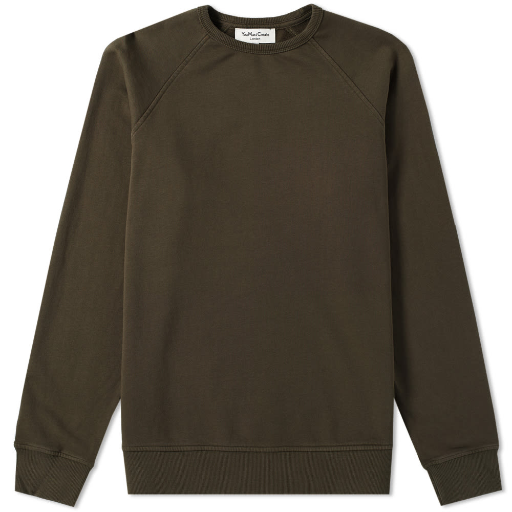Dressed in a military-esque shade of green, this rendition of the “Schrank” raglan sweatshirt from YMC offer the perfect combination of comfort and subtle contemporary style. Constructed with a brushed jersey fabric, the London-based brand classically style their sweatshirt with ribbed trim to the crewneck, cuffs and hem.  

100% Cotton
Brushed Jersey
Garment Dyed
Raglan Sleeves
Ribbed Crewneck, Cuffs & Hem