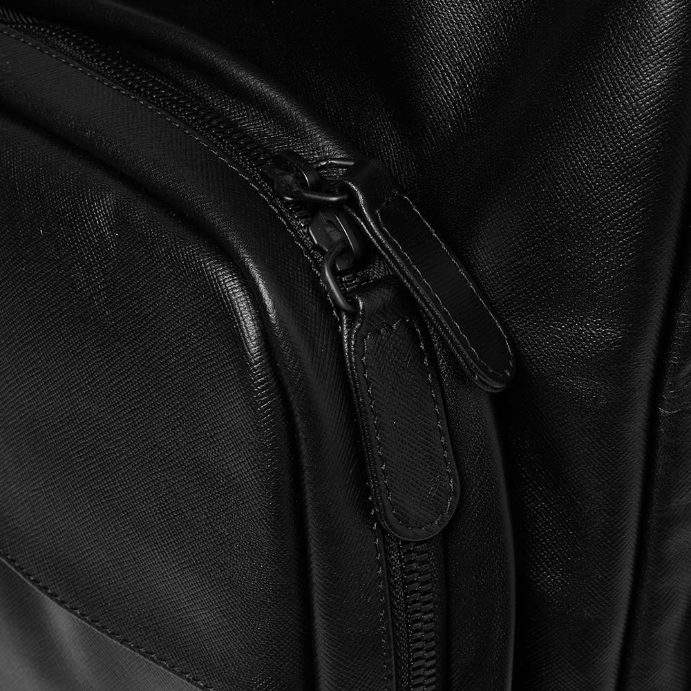 black backpack many pockets