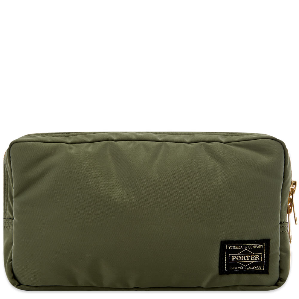 Designed with military-minded appeal, this Porter-Yoshida & Co. Pouch is perfectly sized for your grooming essentials. Built with a highly durable nylon shell, the small accessory features a main zip compartment, whilst another zip pocket resides to the back for easy-to-reach access.  
 
100% Nylon 
Main Zip Compartment 
Zip Pocket 
Woven Brand Patch 
Made in Japan