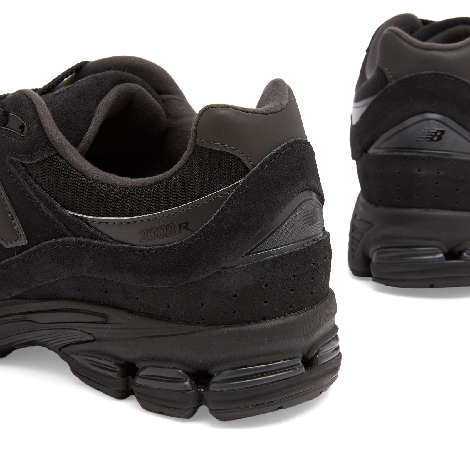 New Balance U2002RBL Sneaker Black - Curated Menswear