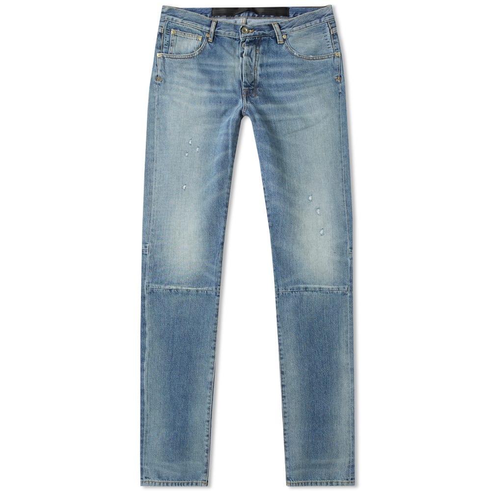 Destroying to create, Unravel Project live up to their ethos with this pair of skinny jeans. Decorated with articulated seam details at the knee, the denim pair give the impression that they have been reconstructed. Washed for a worn-in appeal, the wardrobe essentials echo Taverniti's unique approach to contemporary menswear. 

100% Cotton
Stonewashed Appearance
Skinny Fit
Button Fly
5 Pocket Set Up